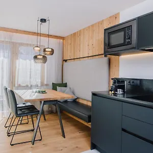 https://alpinlounge-ratia-appartements.ischgl-hotels.net